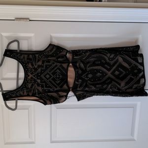 Free people mini dress size 12 beaded and studded with see through holes